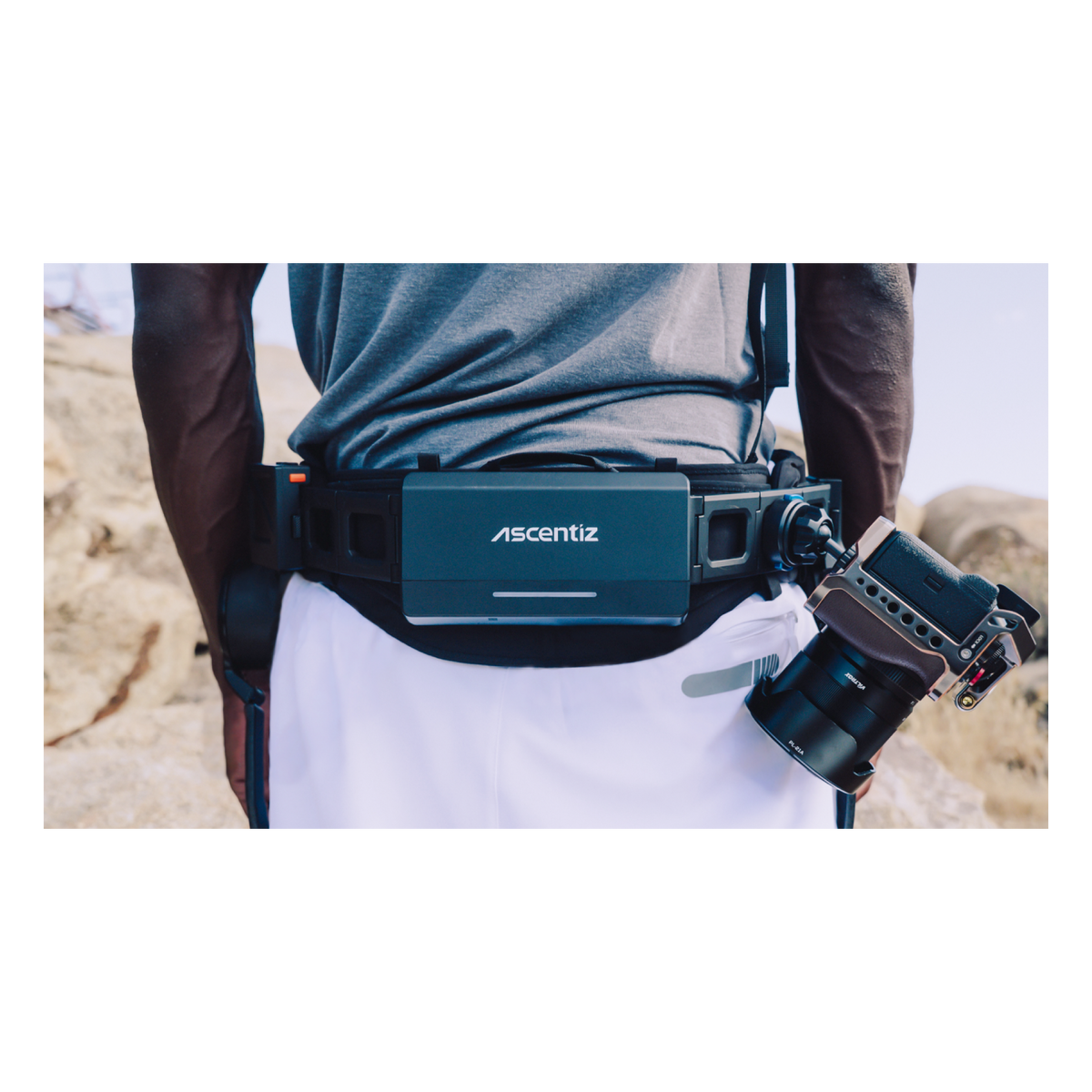 Rear view of an Ascentiz Exo-Belt with the 1/4-inch threaded mount holding a camera at the hip