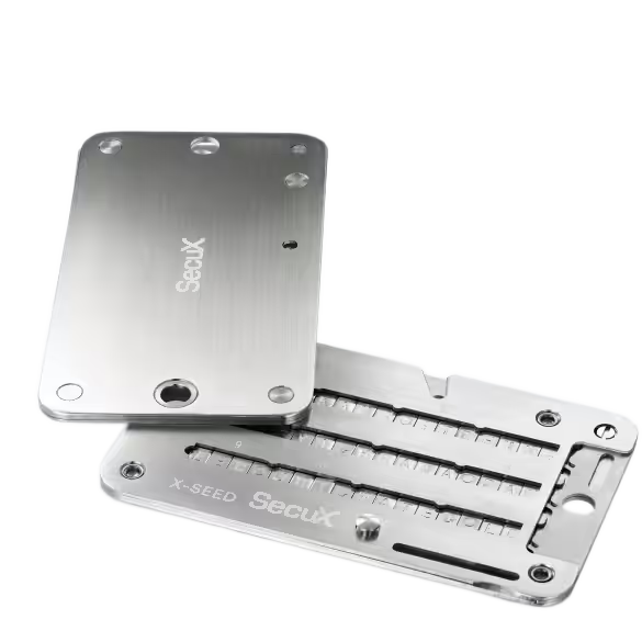 SecuX X-SEED PRO stainless steel seed phrase storage opened to show the letter tile slots, official SecuX image