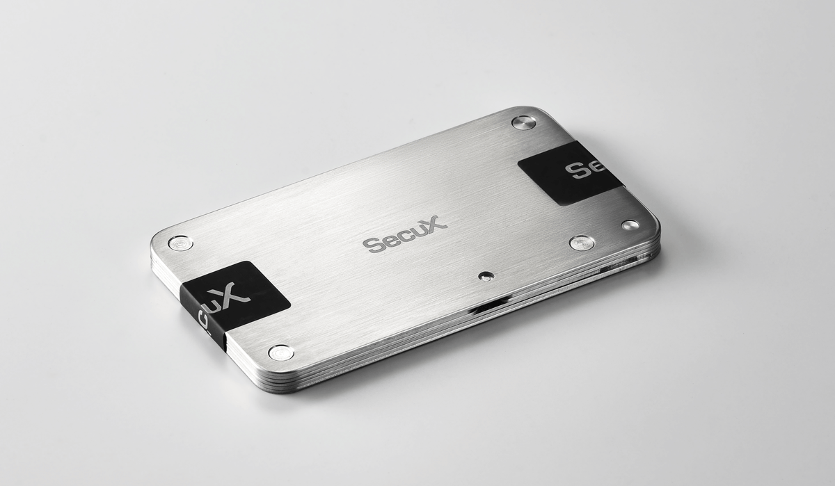 SecuX X-SEED PRO stainless steel seed storage closed and sealed with two tamper-proof stickers