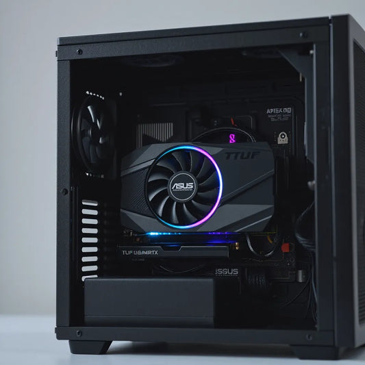 Installed GeForce RTX graphics card with dual fans and heatsink inside a clean desktop PC case