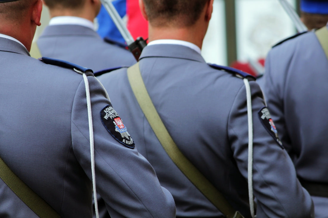 a group of men in uniform standing next to each other