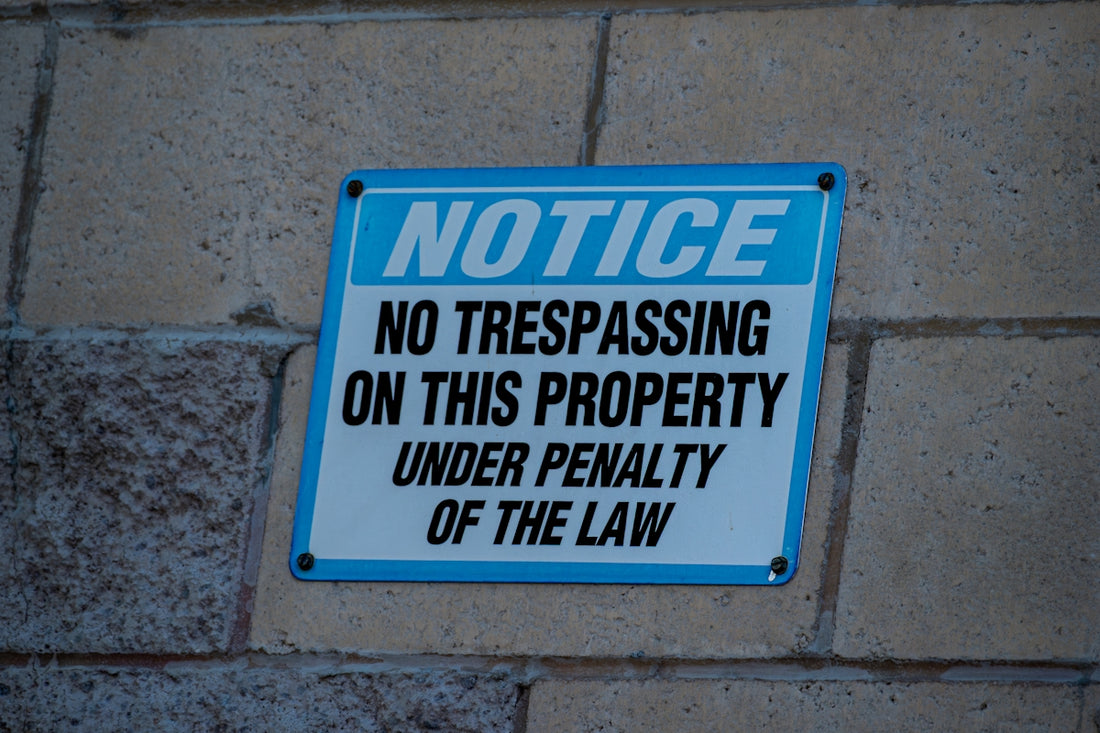 Notice no trespassing on this property sign