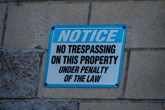 Notice no trespassing on this property sign