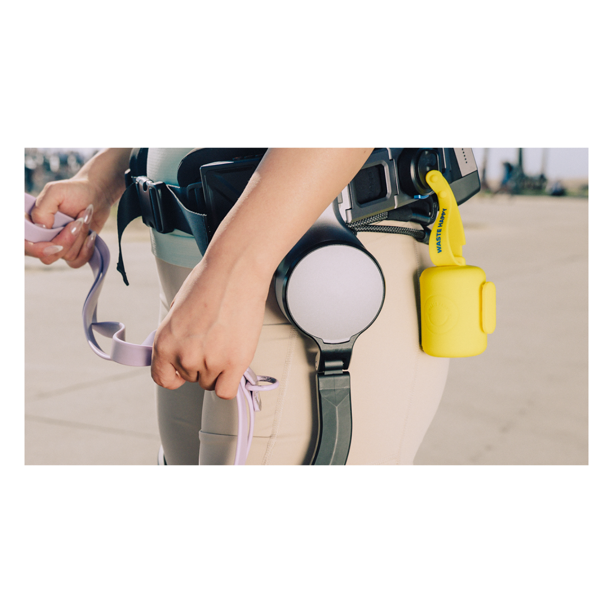 Ascentiz Exo-Belt Velcro attachment mount securing a pouch to the hip module during a fitting