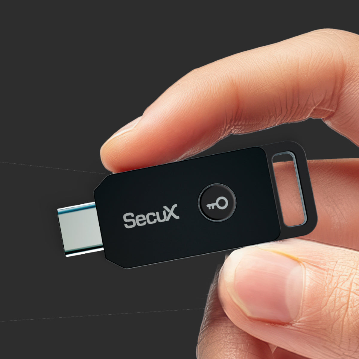 SecuX PUFido Clife Key held between two fingers to show its size, official SecuX image