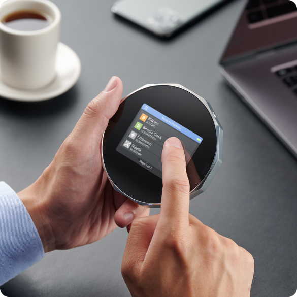 SecuX V20 hardware wallet held in the hand while using the touchscreen, official SecuX image