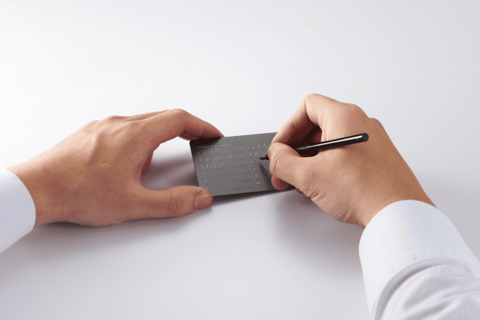 Engraving recovery words on the SecuX X-SEED Plus aluminium plate with the engraver